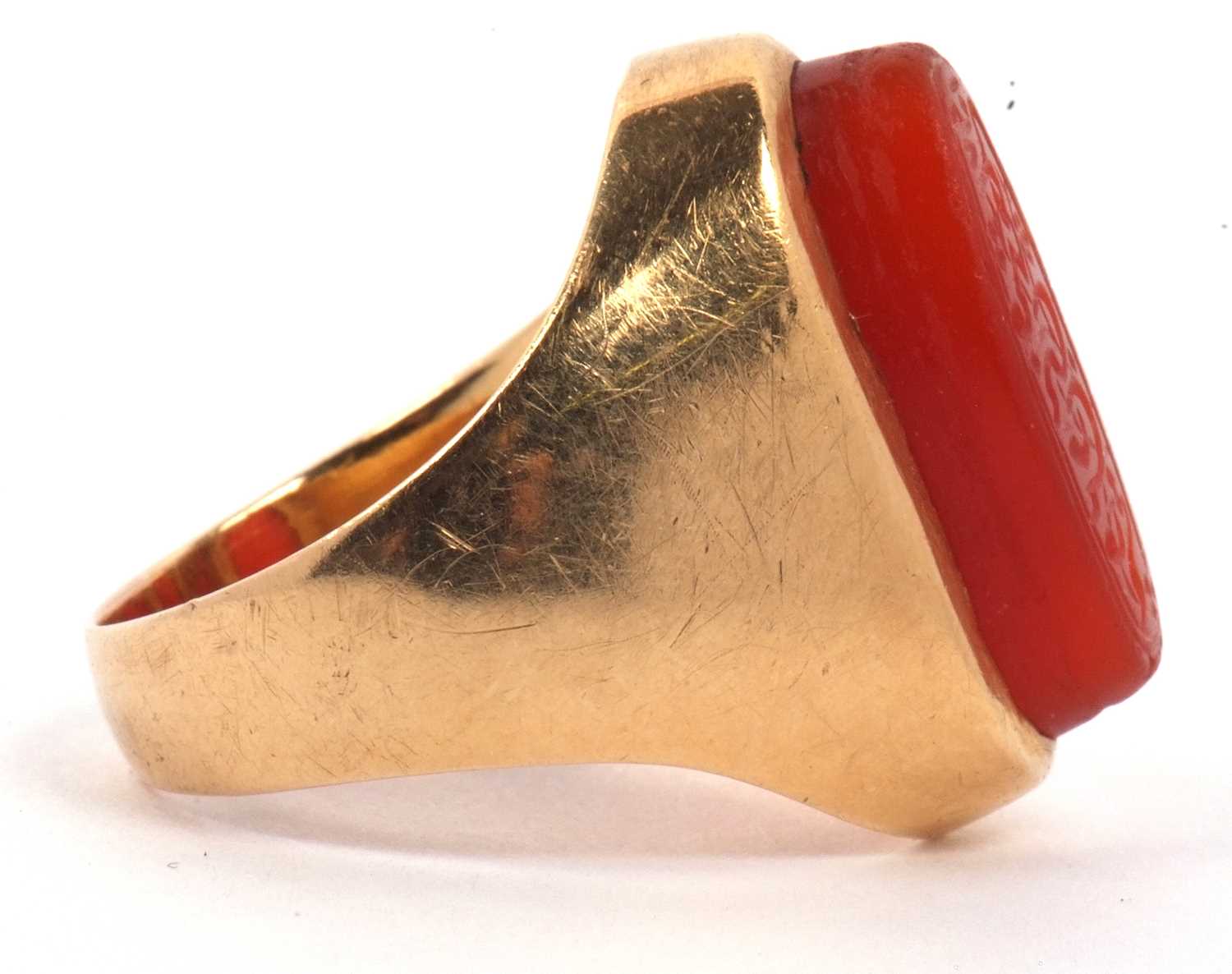 High grade yellow metal and carnelian set ring, the elongated oval shaped carnelian carved with - Image 5 of 7