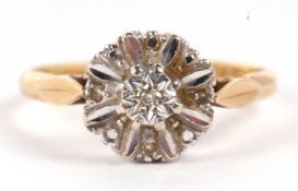 An 18ct diamond ring, the central small round illusion set diamond, surrounded by a floral style