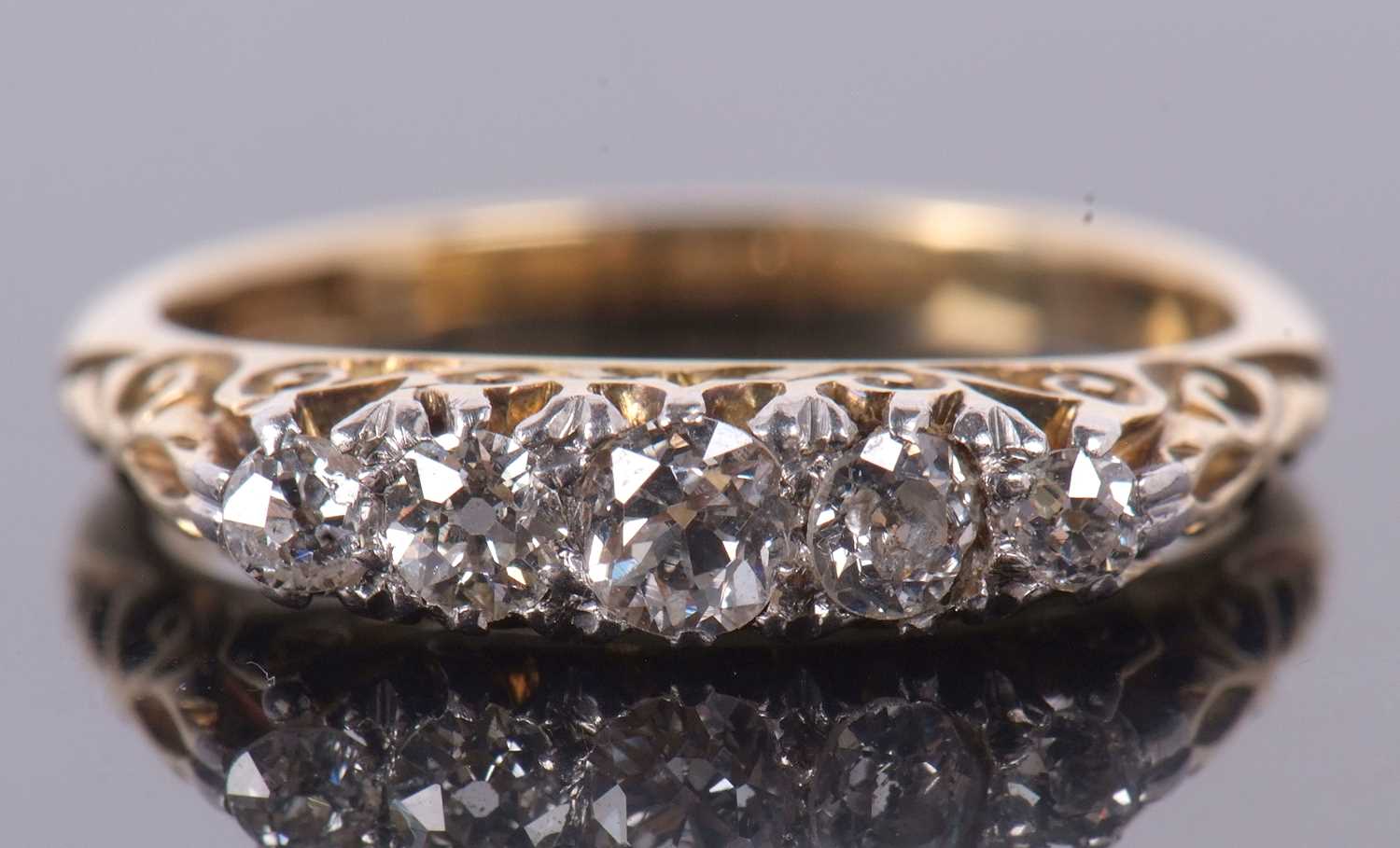 An 18ct five stone diamond ring, the five graduated old round brilliant cut diamonds, set with - Image 5 of 12