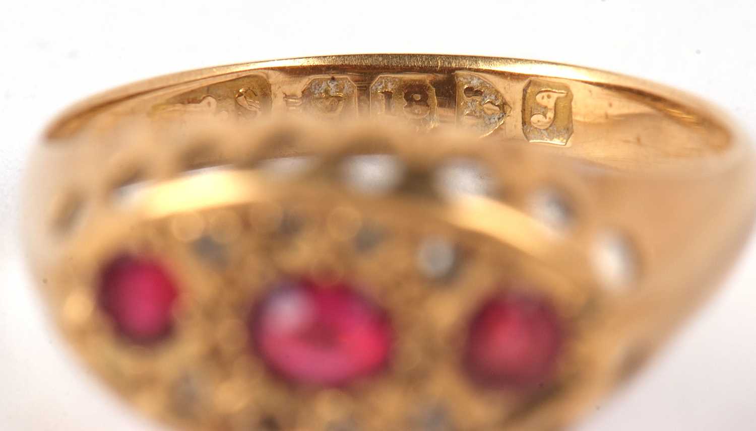 An 18ct ruby and diamond ring, the oval and round rubies set within a marquise shaped plaque set - Image 7 of 8