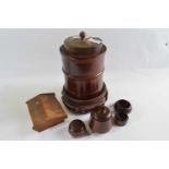 Mixed Lot: Cylindrical wooden box and cover with a hardwood stand, two further small wooden boxes