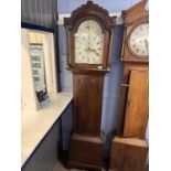 Fuller, Watton, a Georgian long case clock with painted arch dial to a brass eight day movement, set