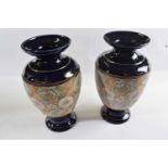 A pair of Royal Doulton vases, the central panel with Slaters patent style decoration with flowers