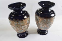 A pair of Royal Doulton vases, the central panel with Slaters patent style decoration with flowers