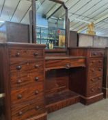 Victorian mahogany twin pedestal drop centre dressing chest with ten drawers and a central