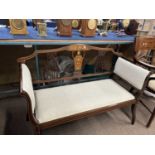 A small Edwardian mahogany framed sofa or window seat with inlaid decoration, 104cm wide