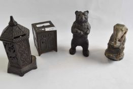 A collection of four late 19th/early 20th Century metal money boxes, some with registered design