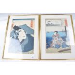 A pair of Japanese wood block prints in gilt frames