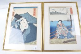 A pair of Japanese wood block prints in gilt frames