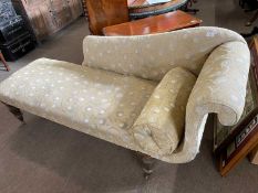 19th Century chaise longue with contemporary upholstery raised on turned legs with brass casters,