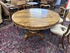 19th Century rosewood circular pedestal dining table raised on a tapering column with four