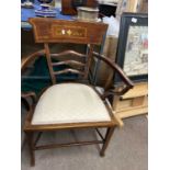 An Edwardian mahogany and inlaid bar back armchair with upholstered seat