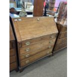 Early 19th Century red walnut bureau with full front opening to a fitted interior with small drawers