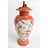 Chinese porcelain baluster vase and cover with dog of fo finial, the orange ground with gilt