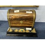 A Victorian coramandel/brass mounted dome top stationery box together with a malechite and brass