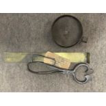 Plastic bag containing a mixed lot including a brass fish rule, tinder box, antique steel sugar nips