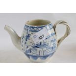 Early 19th Century pearl ware pot with blue and white design and intertwined strap handle