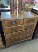 A George II walnut chest of two short over three long drawers raised on bracket feet, 95cm wide