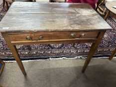 A Georgian oak single drawer side table fitted with brass swan neck handles and raised on tapering