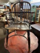 A small 19th Century elm seated and stick back Windsor chair with pierced splat back, turned legs