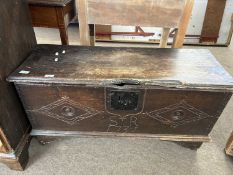 An 18th Century oak blanket box or coffer, the front with carved lozenge decoration and