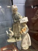 Lladro model of a goose girl together with a smaller model of a orange seller, tallest 22cm high