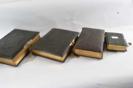 A group of four Victorian photograph albums with various photographs