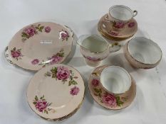 Part Aynsley tea set, the pink ground decorated with roses