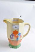 A Clarice Cliff tall jug of faceted form decorated with the crocus pattern