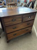 A 19th Century mahogany chest with two short and two long drawers, raised on bracket feet, 95cm