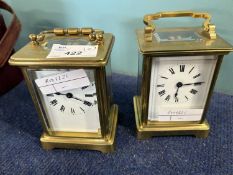 Two small carriage clocks and a further carriage clock case