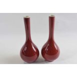 A pair of Chinese porcelain flambe teardrop vases with double concentric circle mark to base, 16cm