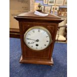 Early 20th Century mantel clock, white enamel dial with Roman numerals, the case with typical inlay