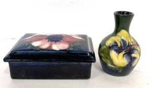Moorcroft box and cover with anemone pattern together with a large glass vase and further small
