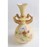 A Royal Worcester blush ground vase decorated with flowers, puce factory mark