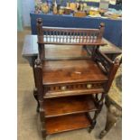 Late 19th Century mahogany what not or side table with small shelf over a mirrored panel and