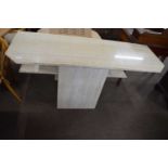 A modern marble pedestal side table, 140cm wide