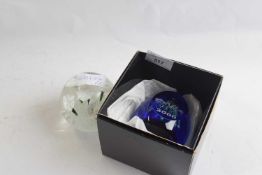 A Midnight Millenium paperweight by Caithness in original box and a further paperweight with white