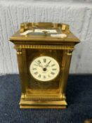 A large carriage striking carriage clock with turned columns, the dial signed Charles Frodsham,