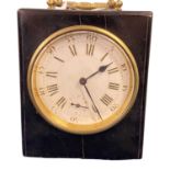 Small black mantel clock in black wooden case, white dial with Roman numerals and subsiduary dial