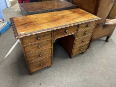 A 19th Century mahogany twin pedestal desk or dressing table with nine graduated drawers, the top