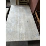 Modern marble coffee table with rectangular top and pedestal base, 127 x 70 cm