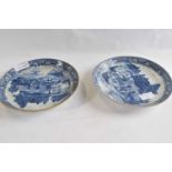 A pair of early 19th Century porcelain dishes with blue and white printed design