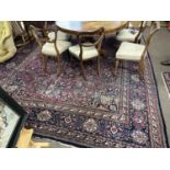 A 20th Century Heriz wool floor rug, 405 x 305cm