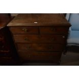 18th Century oak five drawer chest with two short and three long drawers raised on bracket feet, the