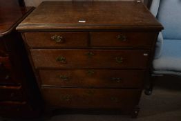 18th Century oak five drawer chest with two short and three long drawers raised on bracket feet, the