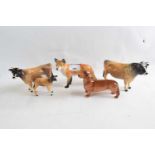 A quantity of Beswick animals, Beswick fox signed John Beswick, small Beswick cow, Newton Tinkle and