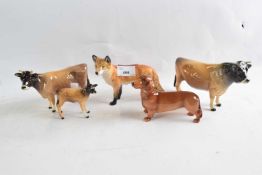 A quantity of Beswick animals, Beswick fox signed John Beswick, small Beswick cow, Newton Tinkle and