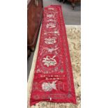 An interesting large piece of Chinese silk with embroidered designs including a peacock with