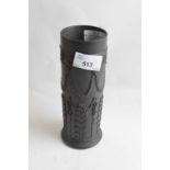 A Wedgwood black basalt vase of cylindrical shape decorated with classical swags and flowers